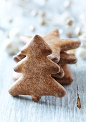 Christmas gingerbread cookies on wooden background. Close up.	