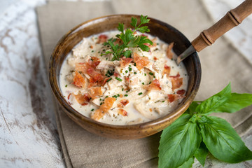 Shredded chicken in cream cheese sauce and bacon cooked in slow cooker