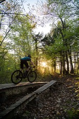 Fototapeta na wymiar Mountain biking at sunset