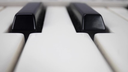 Panning footage of piano keys
