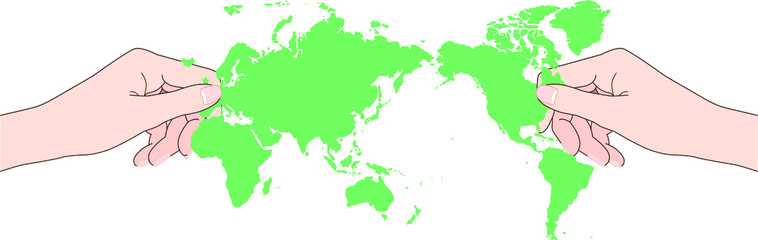 Fototapeta premium 世界地図を持つ手