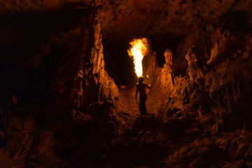 Fire show., dancing with flame. Fakir in the beautiful cave. 