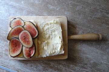 Fig Fruit and Cheese on Bread and Breadboard