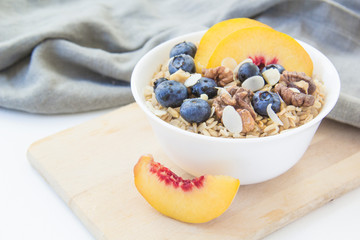 Oatmeal porridge with blueberries. Superfood for healthy nutritious breakfast