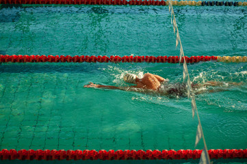 Photo of water splash in swimming pool.