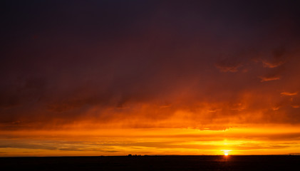 Fototapeta na wymiar Stormy sunset in the prairies