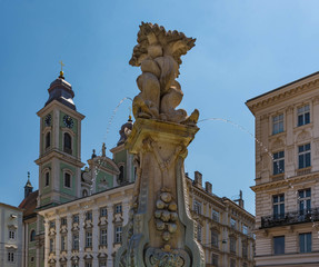 Fototapeta na wymiar Neptunbrunnen am Hauptplatz in Linz an der Donau