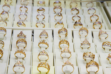 Golden accessories in a jewelery store