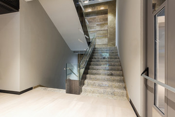 Marble stairs in modern hotel lobby