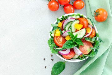 Green salad with tomato and fresh vegetables
