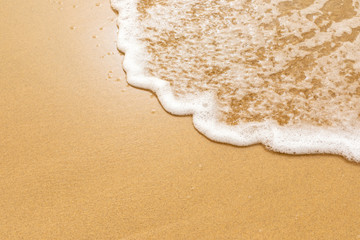 Soft sea wave on the golden sand of Morro Jable beach, Fuerteventura