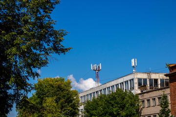 Satellite dish on the roof of an old apartment building