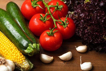 Fresh organic vegetables on wooden background. healthy eating concept. food background.