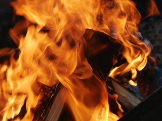 the fire is burning close and flames.