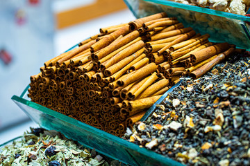 Cinnamon sticks close up at spices market
