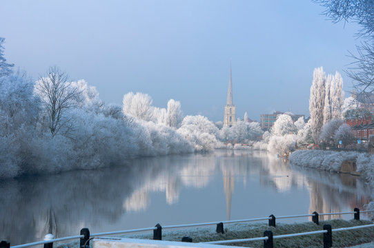 The river Severn at Worcester on a very frosty morning with St Andrew's church. England.