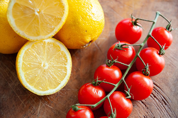 Fototapeta na wymiar cherry tomatoes and lemon