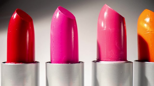 Close up panning video of lipsticks in studio