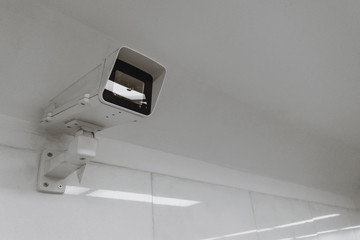 city video surveillance system - security camera under ceiling, side view