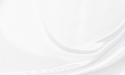 White gray satin texture that is white silver fabric silk background with beautiful soft blur pattern natural.