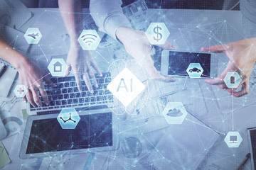 Double exposure of man and woman working together and data theme hologram drawing. Computer background. Top View.