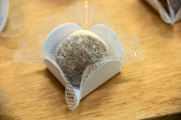 Traditional brazilian sweet on wooden background. Casadinho.