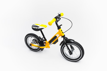 Obraz na płótnie Canvas yellow balance bike on white background