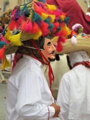 Man in a traditional Mexican mask