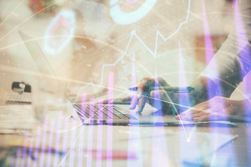 Multi exposure of woman hands typing on computer and financial chart hologram drawing. Stock market analysis concept.