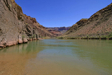 Colorado River beach and Granite Narrows in Grand Canyon National Park, Arizona from riverside trail between Deer Creek Falls and Tapeats Creek.