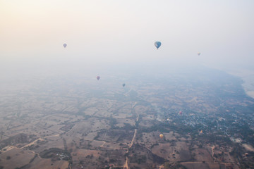 Fototapeta na wymiar Hot air balloon sunrise flight over Bagan, stunning views and panoramas, Myanmar Burma