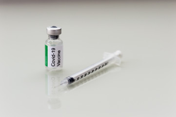 Covid vaccine bottle with syringe