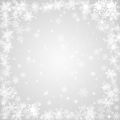 Christmas background of snowflakes arranged in a circle, in gray colors