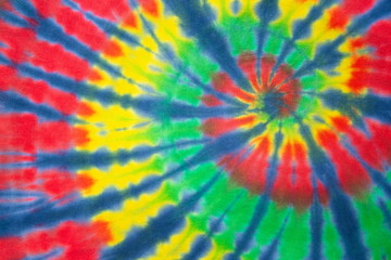 rainbow spiral tie dye colorful pattern. reggae style