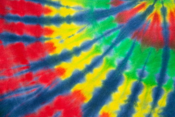 reggae abstract spiral tie dye. red yellow green tricolor pattern.