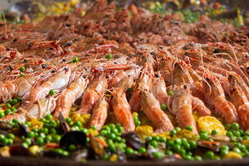 Traditional spanish paella with seafood and pork. Prepared