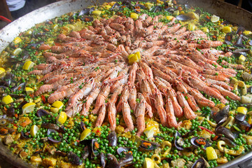 Traditional spanish paella with seafood and pork. Prepared