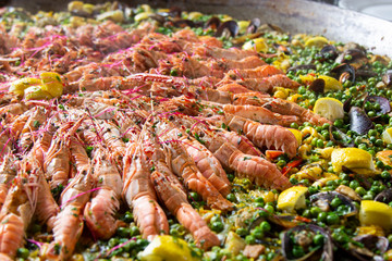 Traditional spanish paella with seafood and pork. Prepared