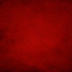 Dark red grunge paper texture background with darkened edges and glowing center.