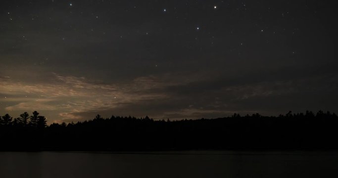 Algonquin Provincial Park Ontario Canada. Neowise Comet time lapse over Sproule Lake. Includes 3 versions - 1 stationary centered, 1 pan right, 1 stationary cropped in to 100%.