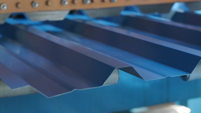 Metal sheet forming machine at the modern metalwork factory.