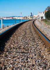 Fototapeta na wymiar Railroad of Faro next to the sea