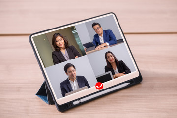 Fototapeta na wymiar business people Working From Home Having Online Group Videoconference On tablet