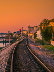 Fototapeta na wymiar View of Faro's Railroad at sunset