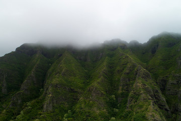 Fototapeta na wymiar Aerial view of lush, green Hawaiian Mountains