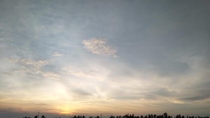 Obraz na płótnie Canvas sunset over the clouds