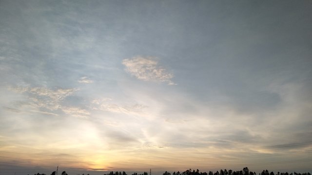 sunset over the clouds