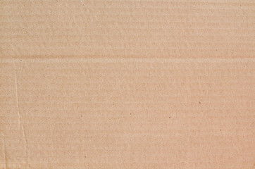 Fototapeta premium Cardboard sheet texture background, detail of recycle brown paper box pattern.