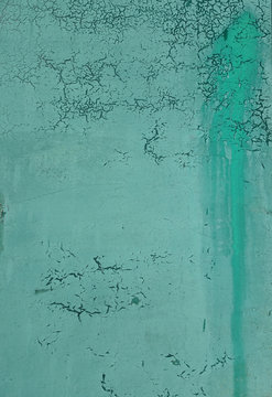 abstract texture turquoise background with cracks and craquelure
