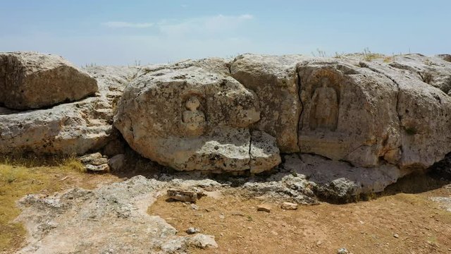 Statue of Sun God and the Moon God. Sacrifices were once made to the sun and moon gods here, whose effigies are carved into the side of the ledge. Soğmatar Şanlıurfa.